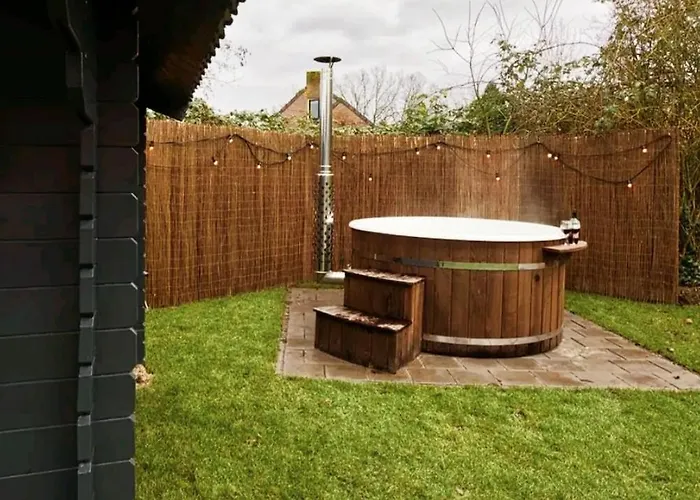 Сasa de vacaciones Scandinavian Wellness Met Hottub & Sauna Ewijk